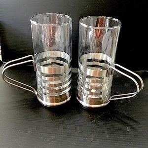 Set of 2 drink cups with stainless steel holders.
